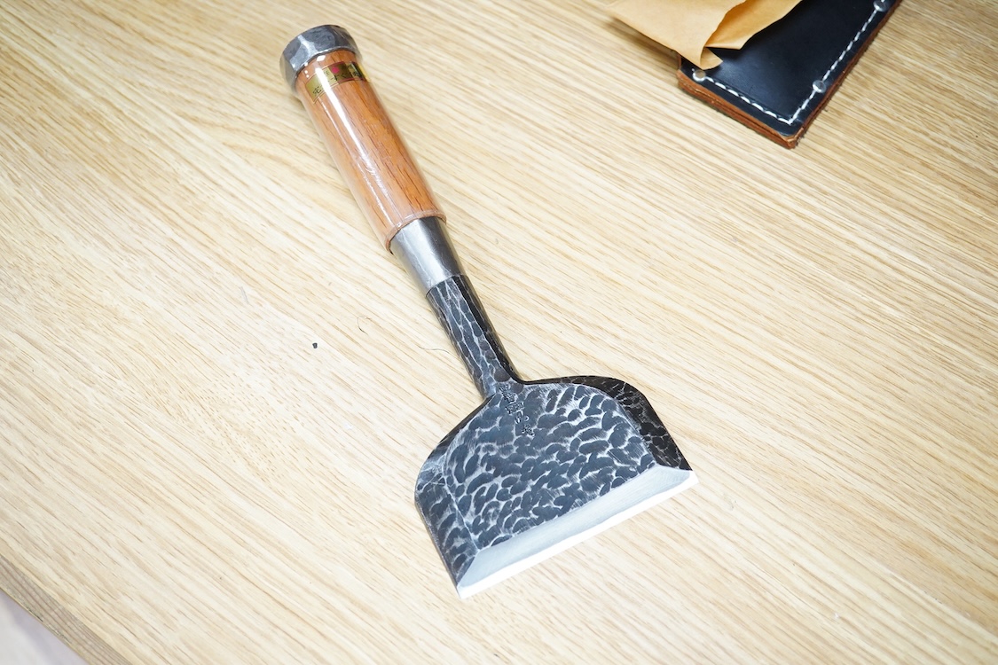 A collection of Japanese woodworking chisels and hammers, including; three boxed large mortise chisels, three boxed timber framing chisels (largest 90mm), and five heavy duty hammers/mallets (11)